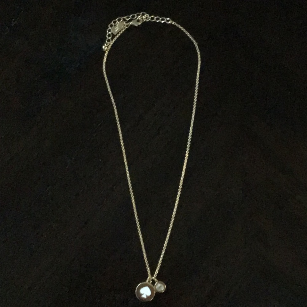 Kate Spade gold and white necklace.